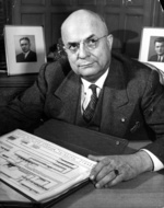 Henry J. Kaiser at his desk, 1943.