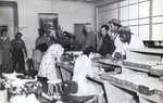 Interior of the Kaiser Field Hospital and clinic, Richmond, California, United States, circa 1943. Note the diversity of the patients waiting for treatment, bearing out their motto “Illness knows no color line here.”