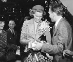 Splattered with champaign, Anna Boettiger (daughter of Franklin and Eleanor Roosevelt) has just christened Liberty-ship SS Joseph N. Teal at Oregon Shipbuilding, Portland, Oregon, United States, 23 Sep 1942.