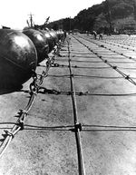 United States Navy sailors constructing submarine nets with floats, Tiburon Naval Net Depot, Tiburon, California, United States, circa 1943.
