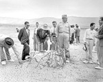 J. Robert Oppenheimer and Leslie Groves at the Trinity test site during a press visit, Sep 1945, photo 3 of 3