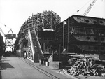 Liberty-ship Booker T Washington on the ways at CalShip, Los Angeles, California, Sep 1942. Note the pre-fabricated double-bottom sections ready for the next ship to be laid down on these ways (Robert C Grier).