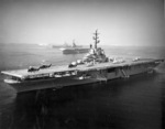 USS Philippine Sea (forebround), USS Bennington, and USS Shangri-La at anchor during a Fleet Review at Long Beach, California, United States, 27 Oct 1956