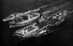 Destroyer USS Zellars and carrier USS Shangri-La receiving supplies from ammunition ship USS Suribachi, Mediterranean Sea, Jan-Aug 1968; seen in US Navy publication USS Suribachi 1968 cruise book