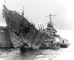 Torpedo damage to the cruiser USS St. Louis sustained during the Battle of Kolombangara on 13 Jul 1943 during the Solomon Island Campaign. The photo was taken at Espiritu Santo on 20 Jul 1943.