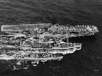 Carrier USS Hornet (Essex-class) and the destroyer USS Nicholas during underway replenishment from the fleet oiler USS Cimarron off the coast of North Vietnam, circa 1966.