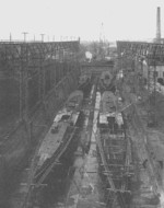 View of the two construction dry docks at Seebeckwerft shipyard, Bremerhaven, Germany, circa 1920s; note four vessels being constructed at the same time, which was the norm rather than the exception