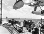 Task Force bound from Kwajalein to Saipan for the invasion of the Mariana Islands, mid-Jun 1944. Photo taken from USS Honolulu. Note the OS2U Kingfisher float plane on the catapult.