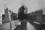 A ship in the floating dock of Neptun Schiffswerft und Maschinenfabrik shipyard, Rostock, Germany, circa 1910s