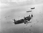 Thirteen SB2C Helldiver dive-bomber from Bombing Squadron VB-3 from USS Yorktown (Essex-class) flying to strike Iwo Jima, 22 Feb 1945.