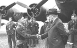 US Secretary of War Henry Stimson presenting the Medal of Honor to Staff Sergeant Maynard H. Smith, at RAF Thurleigh, Bedfordshire, England, United Kingdom, 15 Jul 1943. Photo 3 of 4.