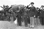 US Secretary of War Henry Stimson presenting the Medal of Honor to Staff Sergeant Maynard H. Smith, at RAF Thurleigh, Bedfordshire, England, United Kingdom, 15 Jul 1943. Photo 4 of 4.