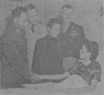Chinese intelligence chief Dai Li visiting He Ruomei in a hospital, China, 17 Aug 1945; He had been arrested and tortured by the Japanese in Apr 1945 for assisting downed US airmen; note US General George Stratemeyer in background