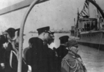 Wang Jingwei attending a ceremony in which a number of Japanese vessels were transferred under puppet regime control, China, 1940; note presence of Japanese officer