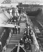 Officers and men of the Gato-class submarine USS Silversides assembled on deck for the boat’s commissioning at the Mare Island Naval Shipyard, Vallejo, California, United States, 15 Dec 1941.