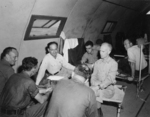 Ernie Pyle interviewing combat photographers, Guam, 1945