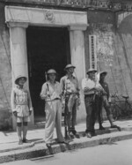 Joris Ivens, John Fernhout, and Robert Capa with two young militiamen at the Guangdong Anti-Japanese Volunteer Force