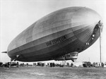 German airship Graf Zeppelin seen moored to a temporary mooring mast at Mines Field, Inglewood, California after arriving from Japan on her around-the-world flight, 26 Aug 1929. Photo 1 of 3.