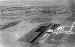 Aerial view of Mines Field, Inglewood, California, mid-1929. Note Hangars No. 1, 2, and 3 and a 3,500-foot oil and gravel runway.