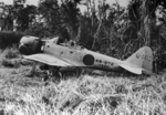 Abandoned A6M3 Model 32 Zero fighter (Lt. (jg) Kazuo Tsunoda), Buna, New Guinea, circa 1943; the four characters below the serial number noted Bang Uiseok, name of the Korean who funded this aircraft