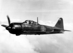 Side view of a captured A6M5 Zero fighter in flight, 25 Sep 1944