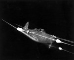 P-39 Airacobra during a test flight with all weapons firing, 1941