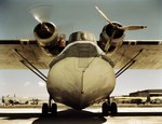 Close-up of the nose of a PBY Catalina aircraft being serviced at Naval Air Station Corpus Christi, Texas, United States, Aug 1942