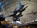 F4U Corsair, P-40E Warhawk, and Lysander aircraft on display at the Smithsonian Air and Space Museum Udvar-Hazy Center, Chantilly, Virginia, United States, 26 Apr 2009