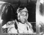 African-American pilot Ensign Jesse Brown in the cockpit of a F4U-4 Corsair fighter, early 1950s