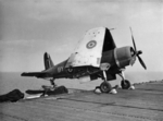 Corsair Mk II fighter aboard an escort carrier in the Indian Ocean, 1945; note outrigger device which allowed the fighter to extend beyond the flight deck thus saving deck space