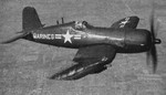 US Marine Corps AU-1 Corsair fighter in flight, 1952; seen in May 1952 issue of US Navy publication Naval Aviation News