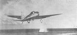 D3A dive bomber taking off from carrier Akagi to join the second wave of Pearl Harbor attackers, 7 Dec 1941