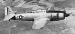 Captured D4Y3 Model 33 dive bomber in flight, wearing US markings