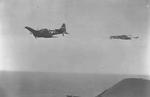 A-24A Banshee aircraft (serial number 42-60881) towing a target sleeve, 1944; this was the last A-24A built, designated RA-24A as a target towing aircraft