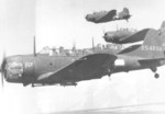 A-24B Banshee aircraft of US 635th Bombing Squadron in formation over US Territory of Alaska, 1943; nearest aircraft was A-24B-1-DT aircraft (serial number 42-54298) 