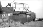 German DFS 230 glider with a MG 15 machine gun mounted on top of the aircraft and another stowed next to the cockpit, Italy, 1943; note Hs 126 aircraft in background