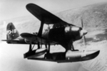 F1M1 seaplane flying over Rabaul, New Britain, Bismarck Islands, 1942-1944