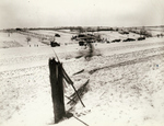 B-17 Flying Fortress bomber having crash landed on a snowy field, Europe, 20 Jan 1945