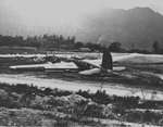B-17C Flying Fortress bomber at Bellows Field, Oahu, US Territory of Hawaii, 8 Dec 1941; she was forced to belly-land on previous day during Japanese attack