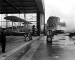 BF2C-1 Goshawk fighter (right) at a National Advisory Committee for Aeronautics hangar, United States, 10 Apr 1936; note NACA chief test pilot Melvin Gough in foreground