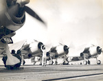 F6F Hellcat fighters of Fighting Squadron 6 warming up aboard USS Intrepid, 1944, photo 1 of 2