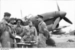 German pilots being briefed before a mission, Arras, France, May 1940; note Ju 87 Stuka aircraft in background