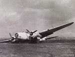 Collapsed Ki-21 bomber, Penfoei, Timor, Dutch East Indies, 2 Oct 1945; the aircraft had an accident while bringing General K. Yamada to Timor for the surrender ceremony without anyone being hurt