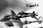P-38H Lightning aircraft of 55th Fighter Group, US 38th Fighter Squadron over RAF Nuthamstead Airfield, England, United Kingdom, en route to attack Southern France, Feb-Apr 1944