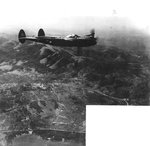 P-38 Lightning fighters escorting US 43rd Bombardment Group aircraft over New Guinea, 1942-1943, photo 1 of 2