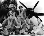 US Army Air Force First Lieutenant James Muri and his crew posing before their B-26 Marauder, Midway, Jun 1942