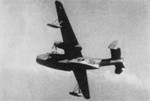 Dutch PBM-5A Mariner aircraft in flight, New Guinea, circa mid-1950s, as seen in the Oct 1956 edition of the 