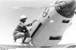 German crew painting a Bf 109E-4 fighter of JG 27, North Africa, 1941