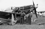 Mechanics working on a P-51D Mustang fighter of Chinese Air Force, Taiwan, 1950s, photo 2 of 4
