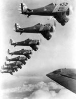 P-26 Peashooter aircraft flying in formation, 1930s